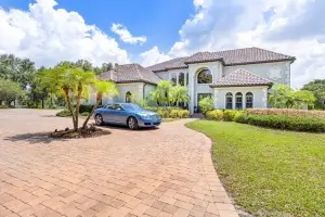 Professional real estate photography by Realty Media 360 of a luxury Mediterranean home exterior in Bradenton Florida